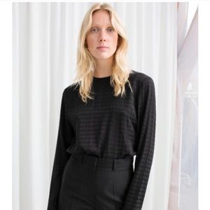 Black blouse with houndstooth pattern
